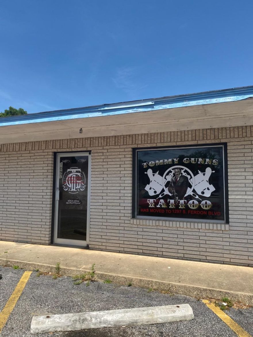 Great Visibility directly on S Ferdon Blvd (Hwy 85). Unit has an open showroom with separate office on the side with kitchenette area and bathroom. Previous use was for a tattoo shop. The other tenants in the complex are a cellphone store, locksmith and nail salon. Parking in front and on side.