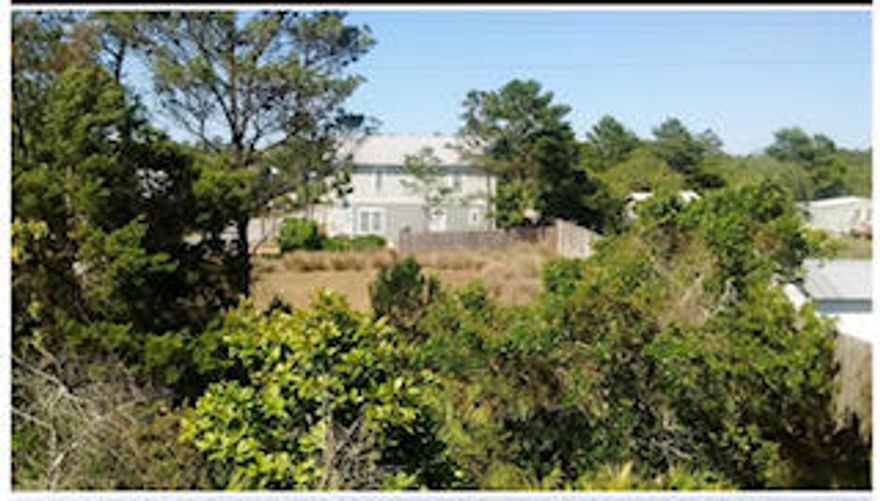 Build your home in Paradise Grove! Gated community with private club house, tennis courts, pool. West end of Panama City Beach , only 10 minutes to 30a and Rosemary Beach. Very quiet and quaint neighborhood with landscaped lots for children to play! Come see this community and lets take a look at this lot for your new home! Call Scott at 850.830.3266 or Sam at 850.830.2876 today!