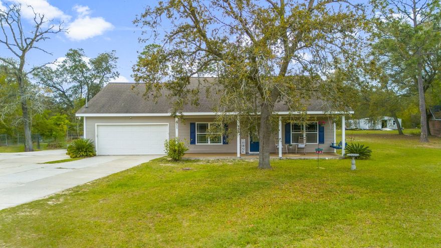 This fantastic home is located in the Sandhills community, convenient to Dean Bozeman School and just 10 miles north of Lynn Haven. Easily access the crystal blue springs at Econfina (9 miles), the beaches of PCB & Pier Park (25 miles), TAFB (apps 28 miles) and the NW FL Beaches Int'l Airport(16.5 miles). There's plenty of room to stretch out with 1.65 acres. The 35x36 pole barn is partially enclosed with a 9'roll-up door which provides extra storage for your toys or camper. Established coop is in place for your chickens. Situated in northern Bay County, you don't want to miss out on this incredible property. If measurements deemed important, please verify.