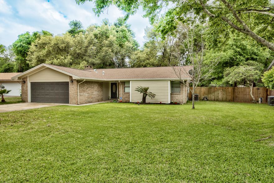 DO NOT MISS the Opportunity to Buy a FULLY REMODELED HOME in the Heart of BLUEWATER BAY! This 3 Bedrooms, 2 Bath home was sophisticatedly updated in 2015 with an Open Concept Design, Beautiful & Functional Kitchen, Fresh Color Scheme, Classic Wood Laminate Floors, Updated Bathrooms, Newer Carpet in the Bedrooms. In 2015 New Roof & New HVAC System, & added insulation were done. The Home is on a transferable Terminix Termite Bond that covers the home until the Spring of 2018. From the Foyer, you are greeted with an open view of the main living space flanked on one side by a beautiful gas plumbed, Brick Fireplace with Wood Beam Mantel in the living area to the ''Chef's Dream'' Kitchen on the opposite end. The Kitchen features all updated stainless steel appliances added in 2015, Gas Range... Wine Cooler are just some of the Many UPGRADES! The kitchen also features fresh white shaker cabinets with soft close drawers and a functional pantry area with a concealed microwave. The Kitchen Island is well positioned to delineate the kitchen and add additional space to cook & eat! This home is well designed for entertaining and has minimal wasted space. The Master Bedroom is located at the end of the hall & it features a walk-in closet, and totally updated bathroom with granite countertop at the sink and a beautiful tile shower! The guest bathroom has also been updated & features a sink with granite countertop. The home also offers the added bonus of a separate interior laundry room off of the garage. The home offers a 2 car garage with added area that the current owners have made into a "Man Cave". The yard is fully irrigated and landscaped to include new sod in the backyard. The backyard offers a fully fenced private sanctuary for its owners. The back of the home is bordered by a Natural Buffer Zone, so you do not have any homes directly behind you! There is also a nature trails that run through the neighborhood along the buffer zone. There is also a separate storage building for yard & lawn toys & equipment. THIS HOME IS A MUST SEE! DON'T WAIT CALL YOUR REALTOR TODAY!