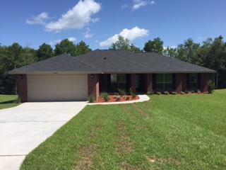 Welcome to Silver Creek Estates located approximately. 15 miles North of the 7th Special Forces & Duke field. The subdivision is also convenient to area schools, shopping, Post Office, Library, & much more. It is like Country Living near the City without City Property Taxes. All the homes in this subdivision are Brick with Low Maintenance Vinyl Siding Trim and Architectural Designer Shingles. All the lots in the subdivision are a generous 1/2 acre Fully Sodded Yard, and Yes a SPRINKLER SYSTEM. This is a 2169 Sq. ft Split 4 bedroom 2 Bath Craftsman Style Floor Plan with a Front and Rear Covered Porch. This also has granite in the kitchen, ceramic tile in the wet areas and a huge 14x16 back covered porch.