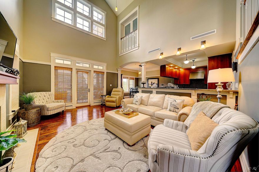 Perfectly positioned ''Sunrise'' in Prospect Promenade. Highly sought after, beautifully furnished 4 bedroom 3.5 bath condo with Master suite on the 1st floor and 2nd floor Master overlooking Coastal Dune Lake Powell. Large wrap around balcony with elevated views of the community pool, boat house, fire pit and boardwalk. Magnificent 8ft. Mahogany front door, detailed hardwood floors, porcelain slate entry, gourmet kitchen with gas range, ice maker, wine refrigerator, grand mantle gas fireplace, vaulted ceilings and lavish crown molding. Located in the private gated coastal sanctuary community of Wild Heron. Elevator and assigned parking underneath the building. Schedule a private tour today!