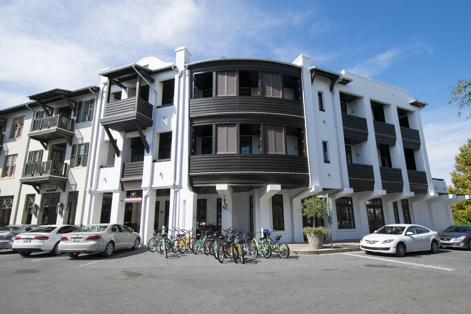 A serene sanctuary in the heart of a bustling beach town #6 Tabby Lofts provides the best of both worlds. Enjoy the peaceful, private balcony overlooking a park-like setting while the vibrant town center hums at your feet, or take the elevator to street level and enjoy the activity, shops & restaurants. This lovely, almost 2000sqft loft boasts three bedrooms, plus two bunks and three full baths on two levels. Elegant, dark-stained hardwood floors run throughout. Beautifully decorated, the living room and dining areas span a bank of windows and doors that may be opened to the large balcony to create an open flow between indoors and out. The entire second floor is home to the master suite and living room. Is that a peek of the beach from the master balcony? Yes it is! Closing mid Dec.