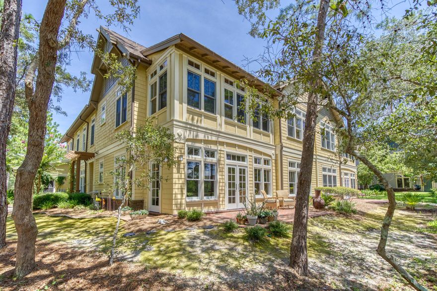 Welcome to Linkside at Wild Heron with the convenience and amenities of a condominium and the comforts of a single-family home with endless nature, privacy, golf access, lakeside amenities and so much more. It is rare for these secluded townhomes to come to market with such versatility. This home has been masterfully renovated to reflect a modern luxury feel and is like no other in the complex. From the chef's kitchen featuring new high-performance appliances: Liebherr counter depth refrigerator with ice maker; Samsung induction stove with two compartment electric oven and warming drawer; stainless steel, lighted, Zephyr range hood; Kraus, high-gauge, stainless steel sink with strainer insert and drainage grates; designer restaurant faucet; high flow Multipure water filter; Cambria quartz counter tops; Bosch dish washer; imported Italian cabinets with custom inserts; open stainless-steel shelving. The home has a single surface, easy maintenance, porcelain tile floor giving it the look of natural stone. 

The tall doorways bring your eyes up to the 10 ft ceilings adorned with beautiful crown moldings. Enjoy socializing with your very own wine bar and wine fridge just off of the dining area, and a surround sound system great for entertaining. The master ensuite is invigorating and spa like with its free-standing soaker tub; oversized, completely tiled, walk-in shower; high-end Grohe plumbing fixtures with rain shower; mounted towel warmer; separate his/her vanities - his with pedestal sink, hers with china vessel sink mounted on large teak vanity with makeup seat. 

The large guest bathroom is welcoming and has a crisp clean feel with its two separate free standing designer vanities with high-end vintage plumbing fixtures and vintage toilet. The guest rooms feature sun filtering shades and light blocking drapes. The best part is no stairs in this single level unit. Because of its unique location with east and south views of waterfront and forested unbuildable greenspace, you don't have to choose between "views" "privacy" or accessible "outdoor space". Walk out your beautiful patio doors and fish off the bank of a large pond teaming with fish, frogs, and turtles; stroll around the woods and enjoy a symphony of birds; or simply relax with a glass of wine by a cozy fire. This property has plenty of storage, a two-car garage and paved driveway for extra parking. 

Living in Wild Heron, a protected nature preserve, provides a peaceful escape from the density and tourist traffic of other nearby locations. It offers superior amenities like the Olympic sized pool, hot tub, fitness center, dock, indoor and outdoor party areas, nature trails, golfing at the prestigious Shark's Tooth Golf Club, tennis courts and the crystal-clear waters of Lake Powell. The Linkside complex has its own pool as well if you are wanting more privacy. For the golfing aficionado there is nothing in the area that compares to the combination of play at Shark's Tooth, Camp Creek, Origins Golf Club and soon to be 4th course. A membership to The Clubs by Joe can open up all of those opportunities as well as access to the Watersound Beach Club with incredible pools, dining, kids club and of course beach access at one of the most incredible spots nestled among rolling dunes that you've ever seen!  Full spec sheets of remodel available on request and you can find membership information at WatersoundClub.com.