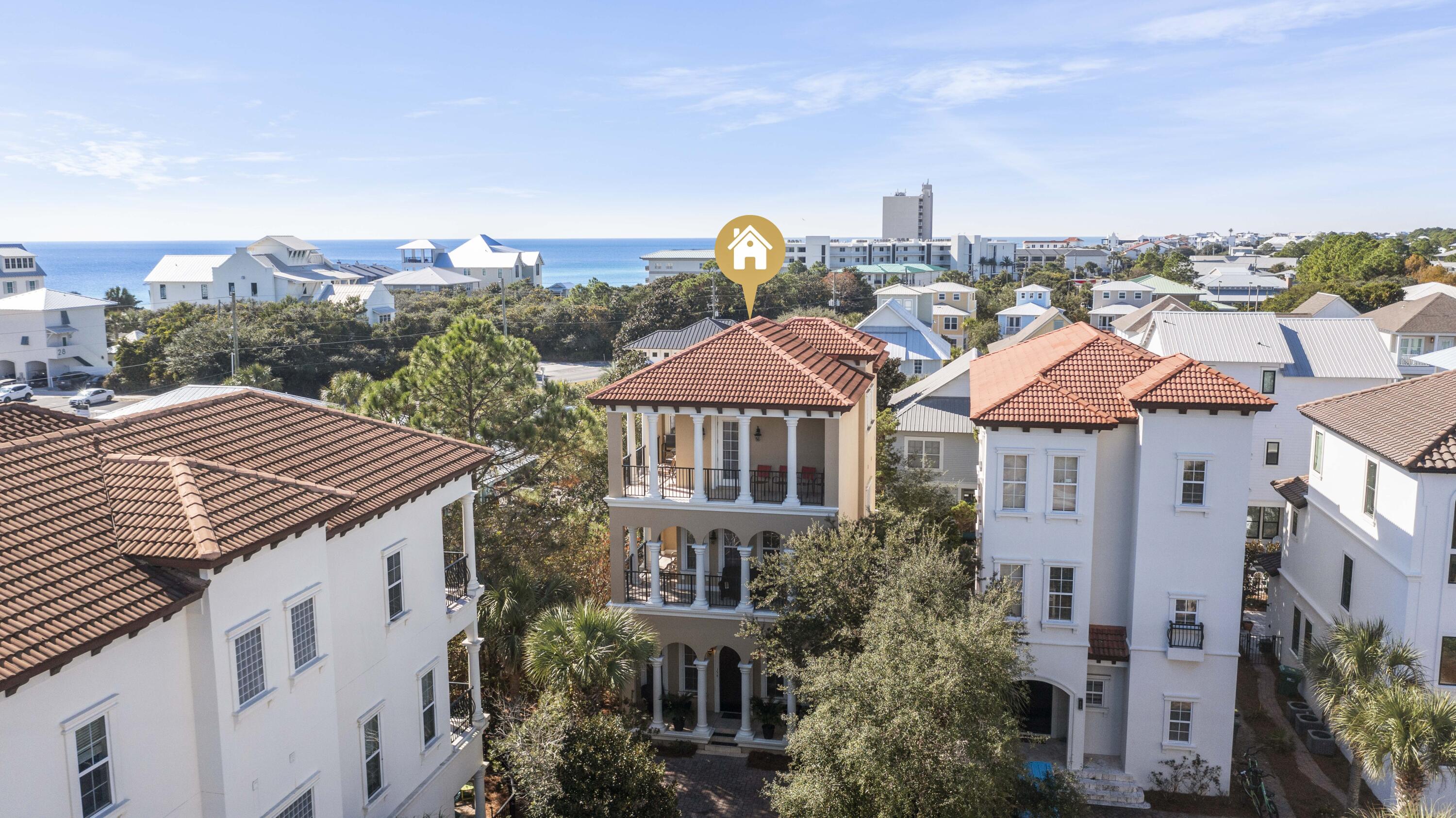 UPDATED, SEE NEW PHOTOS!! This beautiful three-story home located in Palmeira Villas at Seagrove has just over 3,000 s.f. of space made to entertain. Amazing location, across the street from the beach and biking distance to Seaside, perfect for a primary residence/investment opportunity. Main floor is large and spacious with two living spaces in the front and a gracious kitchen, breakfast bar, and dinette to seat up to 10 people on the back of the home. The second floor includes a master ensuite featuring a walk-in travertine shower, jacuzzi tub and walk-in closet. Three additional bedrooms with ensuites complete the second and third floor. Both levels have wrap-around covered porches with peek-a-boo views of the Gulf. Nestled in a small gated community, this home has everything you nee