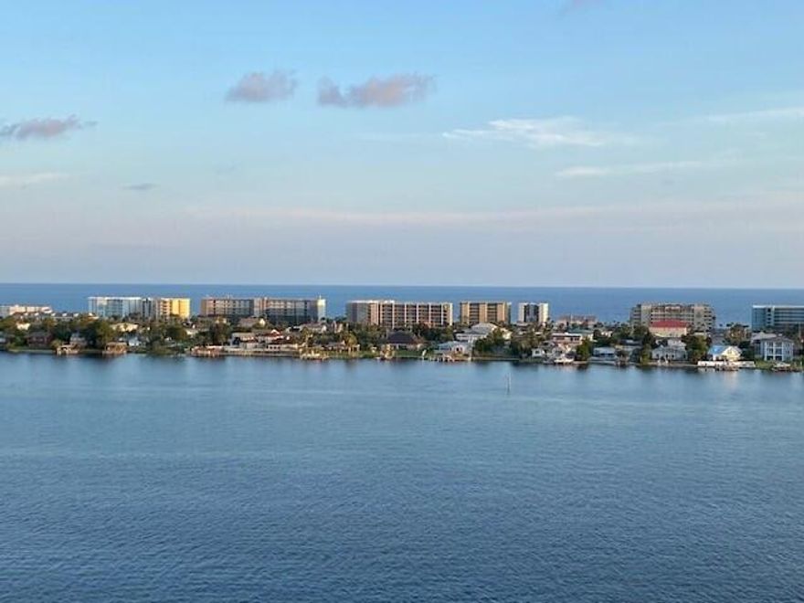 MOTIVATED SELLER!  It's ALL about the SUNSETS at The Presidio.  12th floor waterfront condo with 3 bed/3bath is residential only (6 month or more rentals allowed) located directly on the Santa Rosa Sound (intercoastal) with water views from Destin to Navarre. From the exceptionally roomy balcony, you are in perfect alignment with the intercoastal, Gulf of Mexico and the Bay; Not to mention the incredible sunsets-All from your own private balcony.  Condo is also spacious with an open concept. All bedrooms are en suite with the master having access to the the waterfront balcony. You will love the open outside deck that features a large pool, jacuzzi and an BBQ/picnic area. On the 4th floor you will find the popular media room and fitness center.
Don't have enough room for guest- don't worry; Presidio offers a special guest room complete with a kitchen. All you need to do is reserve it. 
The HOA members are very active and always planning fun activities.  Most of these activities are held in the community room that overlooks the pool and intercoastal on the ground level.  2 deeded parking spaces and large storage area covey with this unit.

You MUST see this view!
