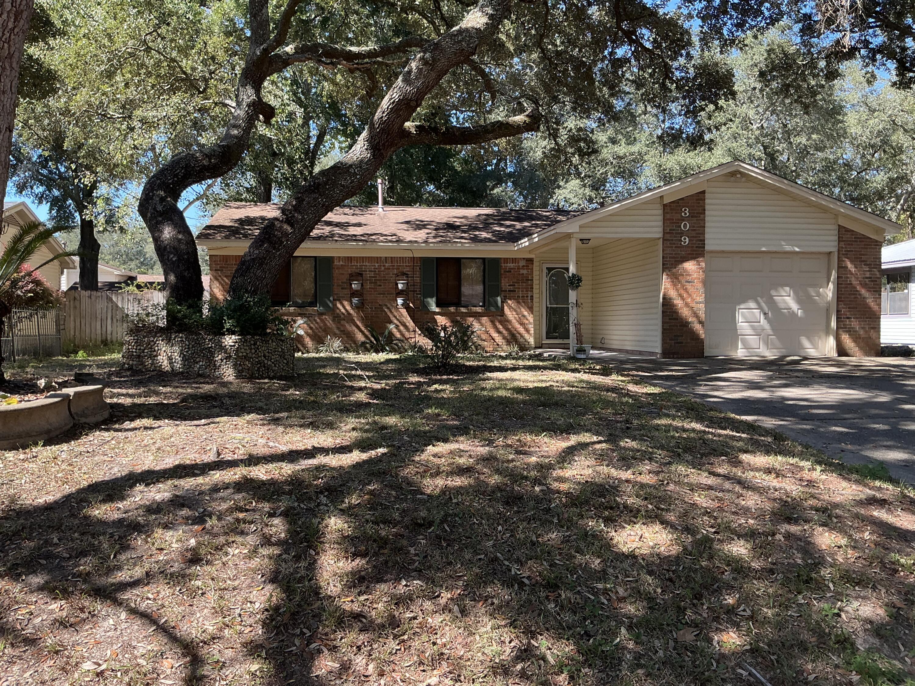 Nestled on a quiet cul-de-sac in one of Niceville's most sought-after neighborhoods, this 3-bedroom, 2-bath home offers endless potential and a welcoming community feel. With sidewalks, streetlights, and nearby parks, it's the perfect setting for anyone who enjoys a walkable lifestyle. Built in 1978 and featuring 1,070 square feet of living space, this home has great bones and just needs a little TLC to make it shine. The open layout, compliments a comfortable living area open to the dining area and a large fenced backyard complete with a storage shed -- ideal for outdoor fun, gardening, or pets.Located less than half a mile from Ruckel Middle School and Niceville High School, and within walking distance to the library post office, the community center, and walking paths. You'll love the central convenience this home offers.
Home is being sold As-Is, Where-Is. The seller is including a one-year home warranty with an acceptable offer for added peace of mind. Roof 2012.