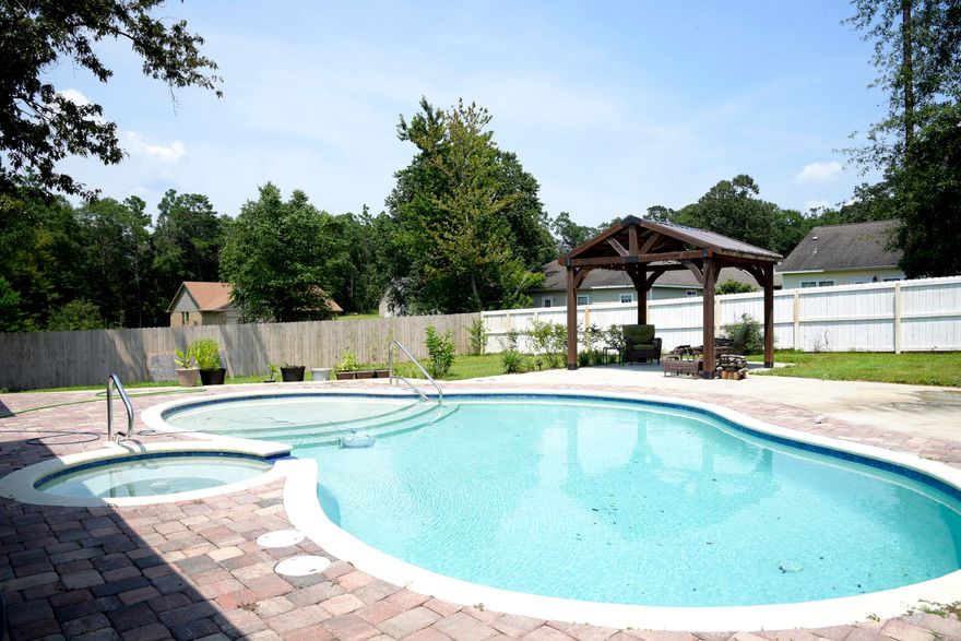 Taking back up offers! This one story BRICK home with a great POOL is tucked away in lovely, quiet north Crestview. With it's open design, four large bedrooms and 3 baths it provides plenty of room for living the Florida lifestyle. There is a large dining room, a gorgeously appointed kitchen with lots of GRANITE counters, STAINLESS appliances and a LARGE BREAKFAST BAR that make the kitchen perfect for large parties or those fall football games! A huge living room gives everyone plenty of space and the many closets help round out a terrific floorplan. The fully fenced backyard is perfect for year round enjoyment and entertainment! The beautiful GUNITE POOL beckons you to dive in and cool off and then enjoy a beverage or meal under the pergola beyond. There are lots of PAVERS and cement for your outdoor furniture, and still there is plenty of grass! The pictures do not do this one justice. You will want to see it for yourself.