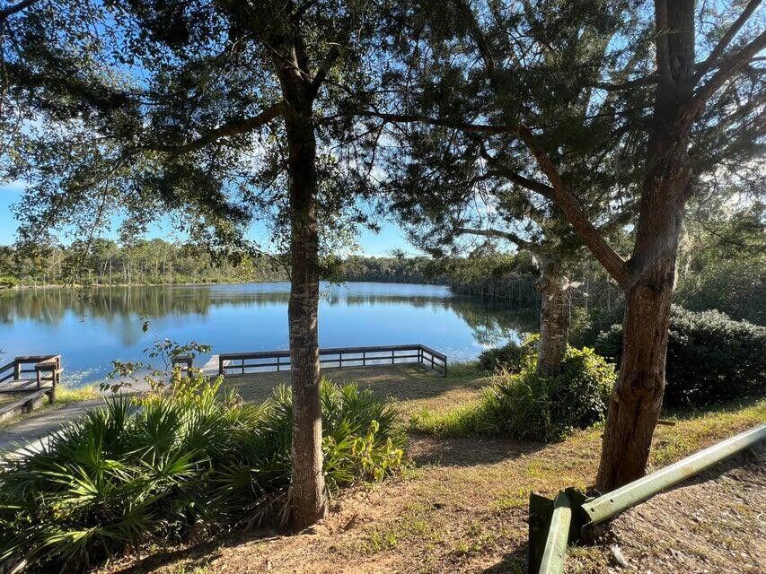 Love Golf? Dream of having a home built in proximity to your clubhouse and golf course without paying high HOA fees? This .443 acre lot is perfect for you. Other than the clubhouse and beautiful Green Golf turf, Sunny Hills offers numerous lakes with white sandy beaches and clear water throughout for recreational activities such as swimming, boating, and fishing, but also provides a short drive, approximately 45 minutes to Panama City beaches when you want to visit a different slice of heaven. Northwest Florida Beaches International Airport, and Pier Park shopping are approximately 45 minutes. Approx. 20 miles from local shopping, medical, and other local amenities in Chipley.