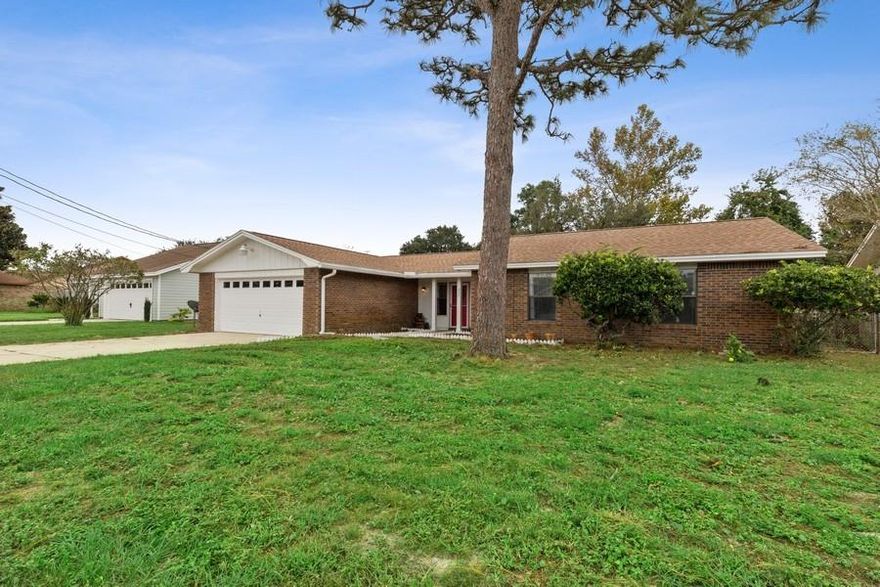 New Roof in 2020, new stainless steel appliances, updated bathrooms, and screened in porch that leads to a large fenced in back yard. This conveniently located home is tucked away in a quiet neighborhood and less than 5 minutes to Hurlburt Field, beaches, shopping, and restaurants.  Interior Laundry Room with large pantry, spacious master bedroom, living room with fireplace and built-in bookcases, eat-in kitchen, dining/office area and more! There is a transferable home warranty and sellers are offering a $500 decorating allowance with accepted offer! Schedule a showing today.