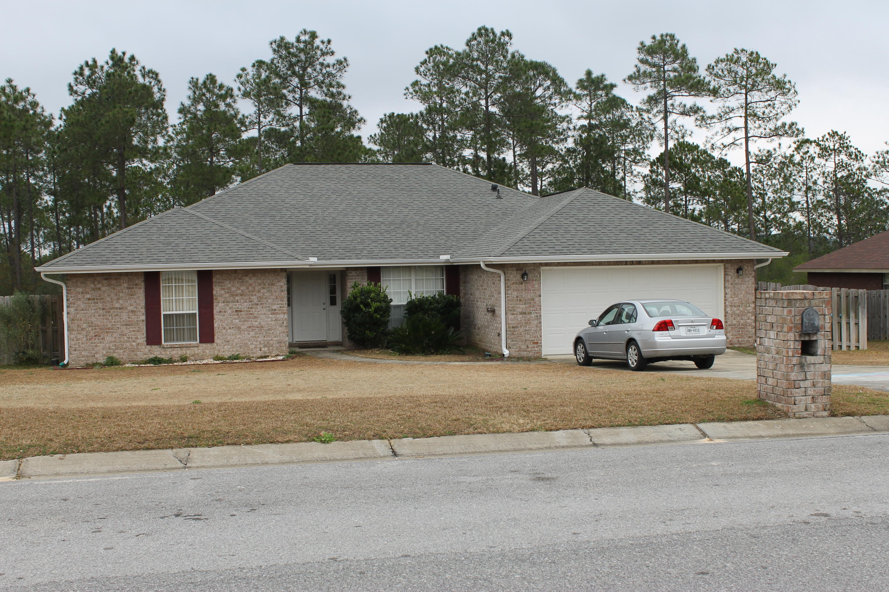 MOVE IN READY! South of I-10! 2100+ sqft never felt so spacious! This open split floor plan,with Jack & Jill bath allows each bedroom it's own bath. Perfect for larger family needs. Family room has fireplace, formal dining or office, eat in kitchen are all features that cater to family life, location caters to quick commutes to & from bases! Spacious laundry room, 2 car garage and large covered back deck are just a few items that make this house worth calling home! Don't wait!!!