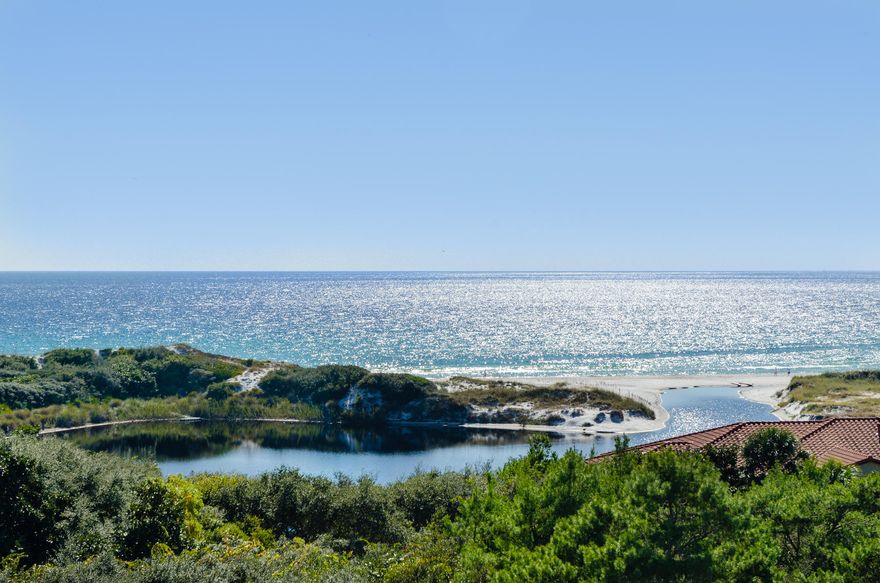 Redfish Lane is a gathering of homes on the south side of Scenic Hwy 30-A in South Walton. Redfish Lane has only 17 lots and is a private, exclusive, gated community with lush natural landscaping, large native trees, including Live Oaks. There is a private access to Little Redfish Lake and the Gulf of Mexico. The HOA has an easement from the south edge of the lake to the beach. This is a tranquil and unique setting that offers a perpetual view of beautiful large sand dunes that are state-owned. The lot is over half an acre and able to accommodate any style home with potential gulf views from the upper floors. There is no build-out time requirement.