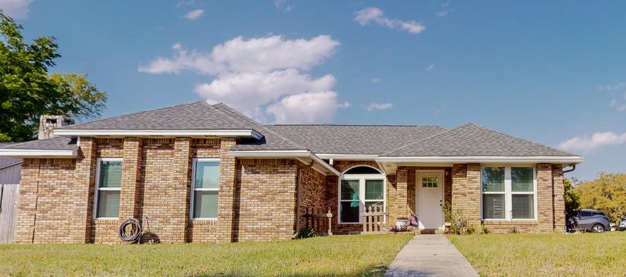 Welcome to The Woodlands of Bluewater Bay.  This outstanding community is home to this all brick home located on a corner lot. Updated wood look tile flooring, fresh interior paint, remodeled kitchen (2018) and bathroom (2018), new roof (2020), and updated windows (2019-2020)  truly make this home move in ready.  The large back yard is complete with firepit and large concrete pad (2020) , 2 large storage buildings, and a hot tub!  The large lot allows for additional parking in addition to the large garage which features extra space for storage or a workshop bench.  Perfect Location!  Just minutes to restaurants and shopping and Destin Beaches is just a hop across the Mid-Bay Bridge.