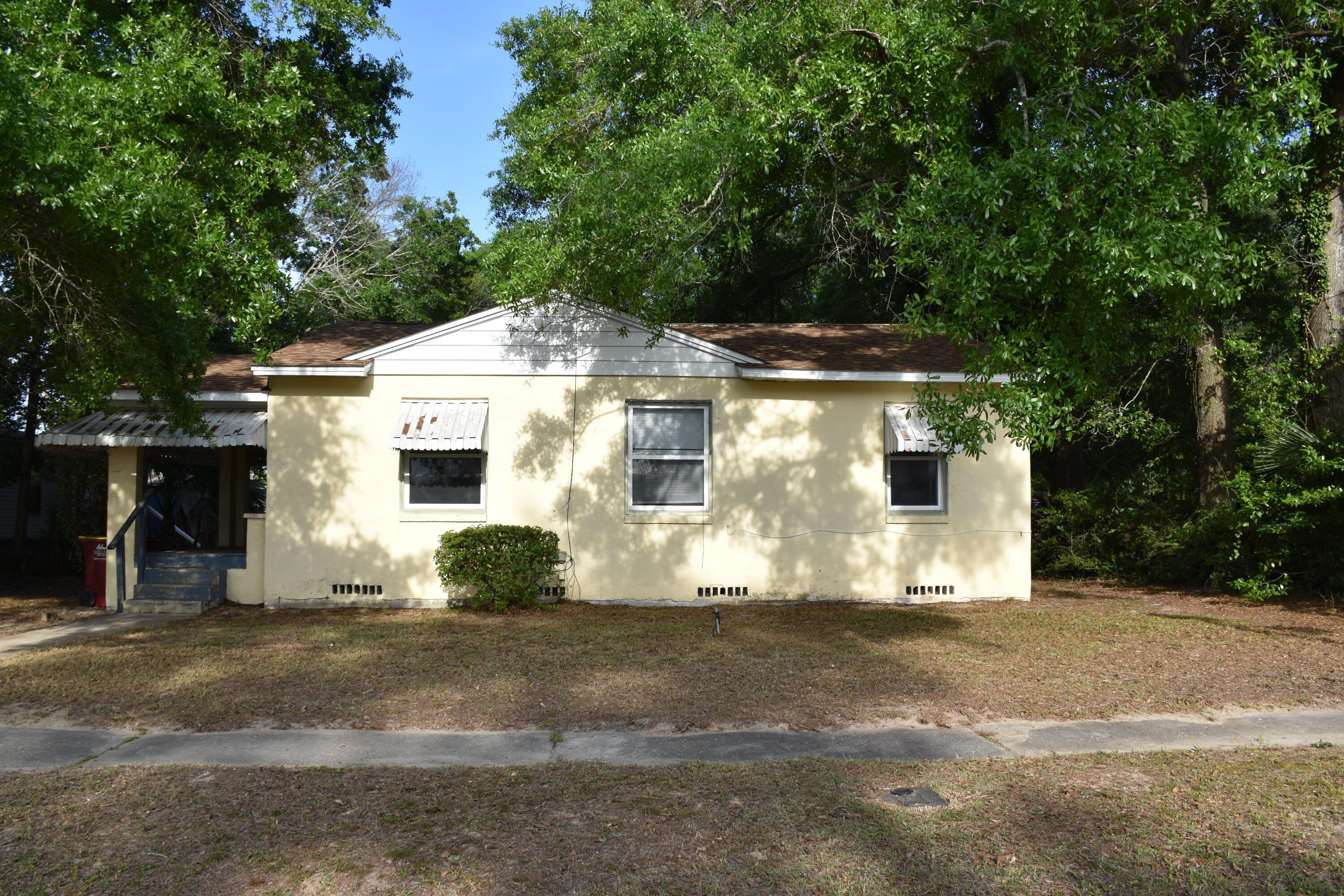 In the Heart of Crestview!Welcome to this spacious and inviting 4-bedroom, 1.5-bath home located in the perfect central location of Crestview, Florida! Just steps from the elementary school, this home is ideal for families seeking convenience and community. Enjoy a large front porch, perfect for relaxing mornings or evening gatherings, along with a generous front yard and a big backyard offering plenty of room to play, garden, or entertain. Inside, you'll find a comfortable living area, well-sized bedrooms, and a practical layout to fit any lifestyle. With easy access to shopping, dining, and major roads, this home offers comfort, space, and a prime location all in one!