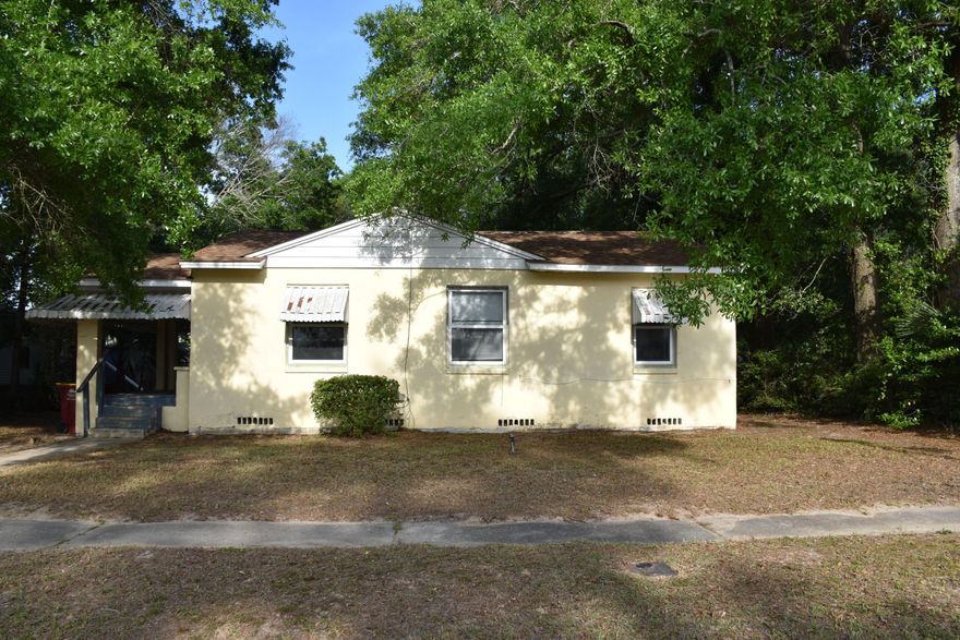 In the Heart of Crestview!Welcome to this spacious and inviting 4-bedroom, 1.5-bath home located in the perfect central location of Crestview, Florida! Just steps from the elementary school, this home is ideal for families seeking convenience and community. Enjoy a large front porch, perfect for relaxing mornings or evening gatherings, along with a generous front yard and a big backyard offering plenty of room to play, garden, or entertain. Inside, you'll find a comfortable living area, well-sized bedrooms, and a practical layout to fit any lifestyle. With easy access to shopping, dining, and major roads, this home offers comfort, space, and a prime location all in one!