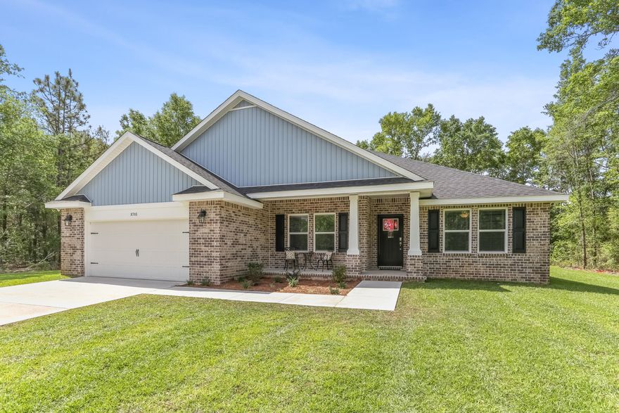 Welcome to Doyle Hawkins Landing, Your dream home is here! The Sapphire Floor Plan is a stunning 4-bedroom, 2-bath home designed for both comfort and sophistication. Featuring an open layout with high ceilings, this home offers a bright and airy living space perfect for entertaining and everyday life. At the heart of the home is a beautifully designed kitchen, complete with sleek stainless steel appliances, quartz or granite countertops, slow-close cabinets and drawers, ample cabinetry, and a convenient separate pantry. The open-concept design flows effortlessly into the living area, while a separate dining room provides flexibility as a formal space or a home office.The split floor plan ensures privacy, with the master suite tucked away for a  serene retreat. The spacious master bedroom showcases elegant trey ceilings and abundant natural light. The luxurious en-suite bathroom includes a double vanity, a private water closet, a stand-up tiled shower with dual shower heads, a garden tub, and two large walk-in closets.
Crown molding accents the tray ceilings, and the home comes complete with installed blinds, and under cabinet lighting for added convenience.

Doyle Hawkins Landing is a quiet, tree-lined enclave featuring just 8 new-construction homes located at the corner of Doyle Hawkins Road and Bob Tolbert Road in Navarre, Florida. Conveniently located minutes from Navarre Beach, local schools, dining, and military bases, Doyle Hawkins Landing offers the perfect balance of privacy and accessibility. 
Pictures are of a similar home, colors may vary.
Home will be completed in March of 2026.

