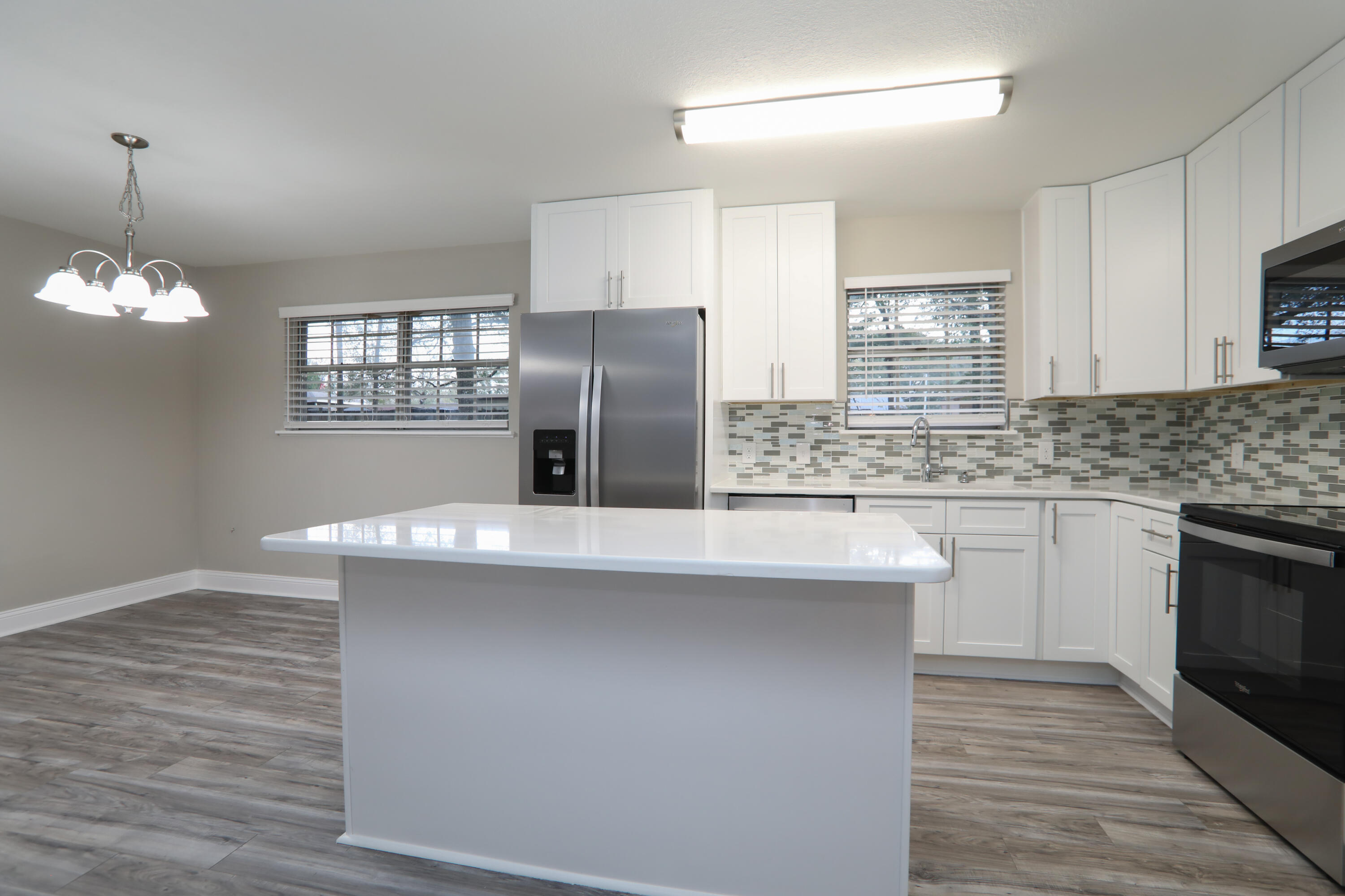 Completely remodeled home. Upgrades include:New kitchen and updated baths with granite. New stainless appliances, new ceiling fans and lights, 2023 Complete rewire, Roof Metal 2012, 2023 Ac, 2023 hot water heater, new Laminate floors all main areas and carpets, new paint in and out. Great Opportunity and with a payment lower than rent.
