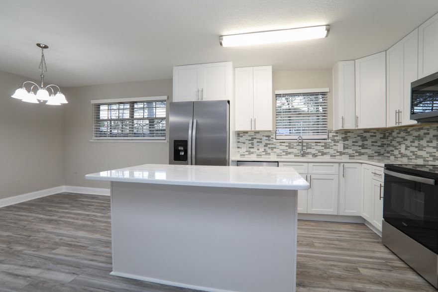 Completely remodeled home. 

Upgrades include:

New kitchen and updated baths with granite. New stainless appliances, new ceiling fans and lights, 2023 Complete rewire, Roof Metal 2012, 2023 Ac, 2023 hot water heater, new Laminate floors all main areas and carpets, new paint in and out. Great Opportunity and with a payment lower than rent.