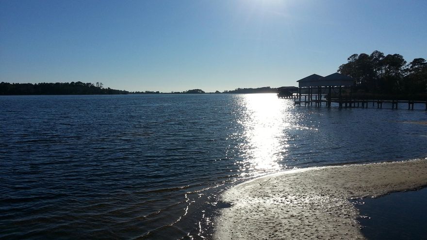 Beautiful Water Views from this home on LaGrange Bayou!! Very open floorplan. Wonderful views of bayou from Kitchen, Dining Rm, Living Rm, Master Bdrm, Guest Bdrm,& Master Bath. Home offers Cathedral Ceilings, Hardwood, Tile & Carpet flooring. Office has built-in cabinetry. Kitchen features large walk-thru pantry, built in oven & microwave. Induction Stove is built in the center island. LaGrange Bayou is on the Intercoastal Waterway and is used by Destin commercial boats during hurricanes. Dock is equipped with electric lift & fish cleaning station. 2 levels of decks great for relaxing or entertaining. All measurements & dimensions are approx, buyer to verify. Flood Ins may be assumable. Square Ft taken from Sellers appraisal.