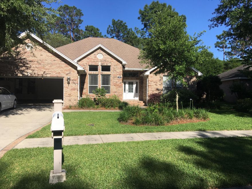 Well maintained POOL home in the coveted neighborhood of Swift Creek! This custom built brick four bedroom/three full bath single level home is located across from the park/playground. Placed on a one/third acre lot, this home has a large fenced backyard that provides protection and privacy for your entertainment activity. A newly refurbished pool covered by a screen enclosure offers relief from insects and leaves. The interior of this former model home features high ceilings with recessed lighting and fans in each room, cove moldings, granite counter tops in the kitchen, travertine stone floors (with carpet in the bedrooms), a fireplace in the family room, and travertine stone in all the baths on the floor, vanity tops, and shower walls.