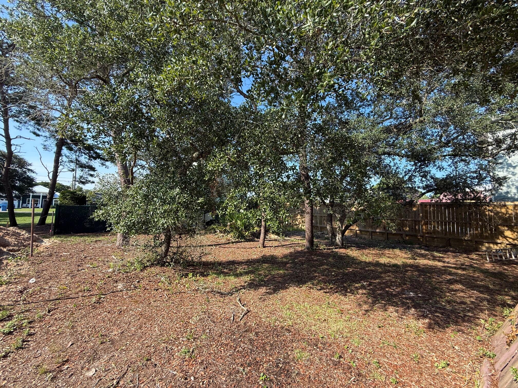 This is a fantastic lot, in a great location, on the coveted west end of Panama City Beach, just a mere 4 blocks to the emerald waters of the pristine beaches of the Gulf Coast! There is a vintage tiny house on the lot to demo but all utilities are in place. This street has a lot of new construction and larger houses being built so there is an opportunity to clear the lot and have a fresh canvas for a new construction !! Short term rentals are allowed for a great investment as an AirBnB or build a vacation getaway or even a primary residence! There are so many options!