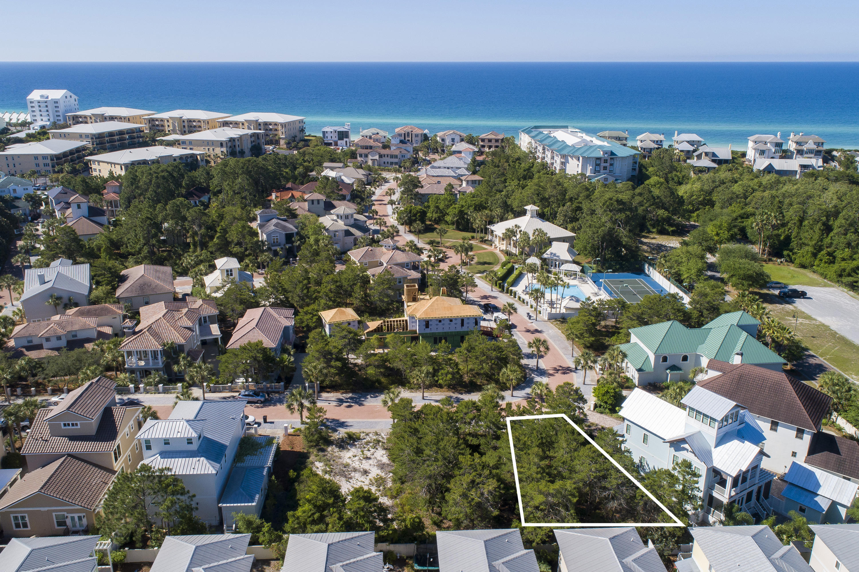 Lot superbly located in the quiet, Block C location, at The Village of White Cliffs, perfect for a beautiful custom built home. Over 1/10th acre lot located in a gated neighborhood comprised of only 63 home sites. The Village of White Cliffs is located on one of the highest elevations on the Gulf and boasts premium amenities. The gated neighborhood is rental restricted and features a heated pool for year-round use and a lighted tennis court. The neighborhood clubhouse includes a fitness room, media room, billiards room, and large kitchen which is ideal for social gatherings. All these amenities are included with very low quarterly association dues.