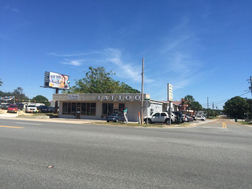 *MOTIVATED SELLER WILL CONSIDER ALL OFFERS* Centrally located flex space located in the heart of Ft. Walton Beach. At nearly 6,000sqft this property offers easy access with great visibility on Beal Parkway. Three tenants currently occupy the building. The automotive company will be moving out upon closing, the Tattoo shop has a lease set to expire and the music store still has their lease in place.This is the perfect space for a buyer in the automotive and performance industry. The equipment currently being used by the automotive repair shop is also available to purchase.