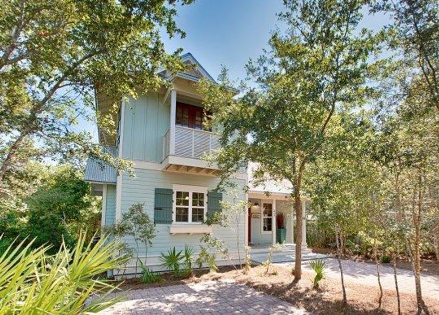 Location, location, location, PRIVACY just steps to the beach! This 3 bedroom and 3 full bath custom built two story home offers approximately 2,170 square feet and features meticulous detail throughout. Located in the secluded gated community Hammocks at Seagrove Beach west of Hwy 395 nestled between Seaside and WaterColor. Arriving at the home lush, natural landscaping engulfs the exterior space which features over 300 sqft in covered and/or screened-in porch space, private outdoor shower and 2 car paver pad. The interior space features a vaulted 100 year old reclaimed wood ceiling in the living room, wide plank wood floors throughout (most of which is also reclaimed), fireplace, abundance of windows, granite countertops, high-end fixtures and stainless steel appliances. The living