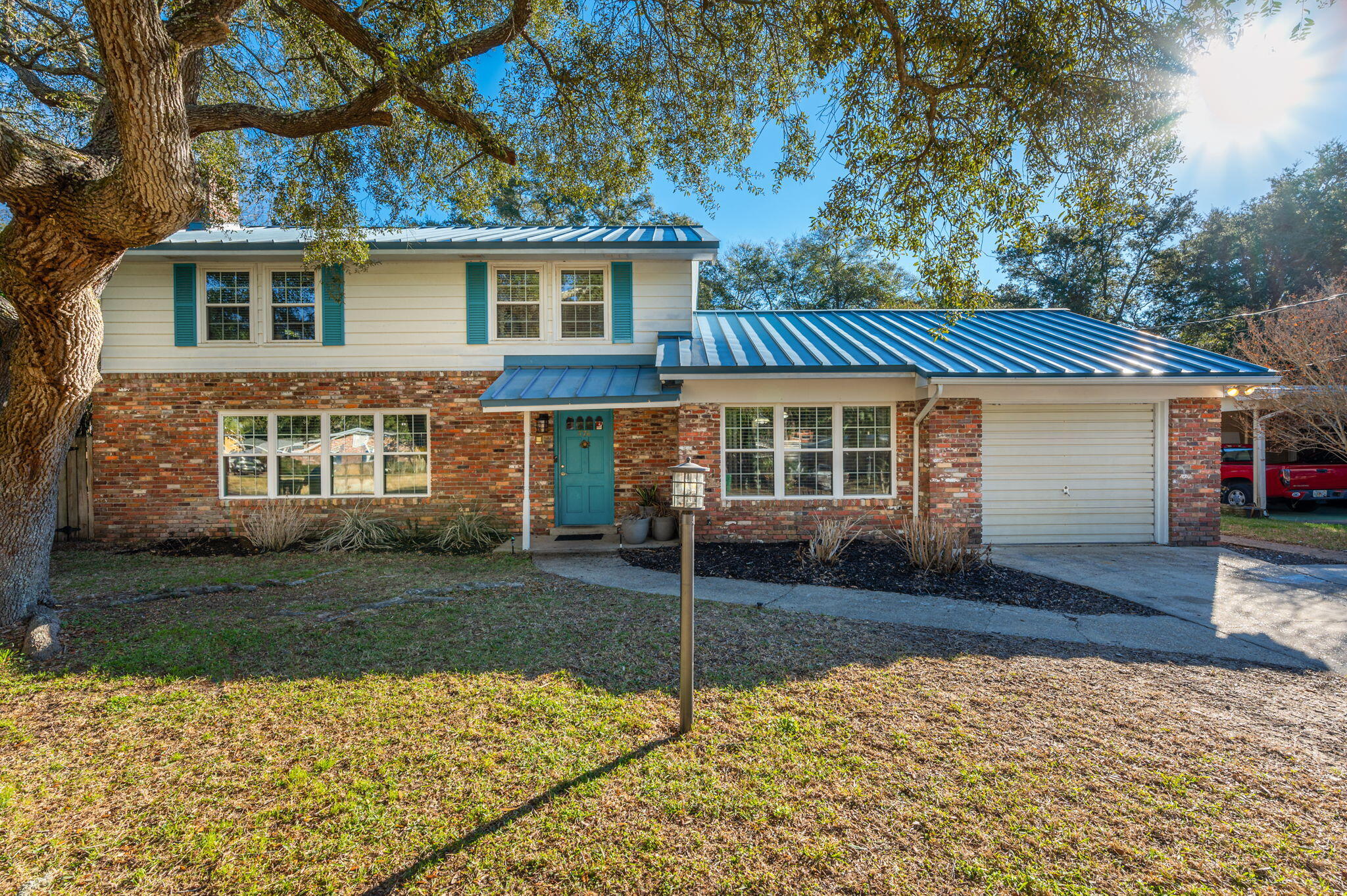 Absolutely stunning home located in central Fort Walton Beach! Meticulously maintained and clean. Minutes to both military bases, and 3 doors down for the neighborhood boat launch! Picture Saturday mornings with friends and family on the water. Or a quiet evening paddle boarding with dolphins.This spacious home delivers in lifestyle. Extra large living areas are perfect for entertaining. Bedrooms are huge with multiple closets for all the storage. Granite countertops, and craftsman accented cabinet doors grace the kitchen. Formal dining, Second living area and a downstairs half bath make this home an oasis. Outdoor living space with a peaceful screened porch and full privacy fenced back-yard for the pets. NO HOA so bring your boat and RV