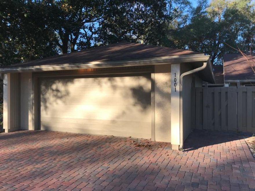 This is what you've been looking for! Desirable END UNIT with a GARAGE in the wonderful community of Royal Oak Village. One story townhome with 2 car garage, 2 bedrooms and bathrooms, 2 living areas plus a bonus room. The beautifully renovated kitchen features granite counter tops, tile back splash, stainless appliances, custom cabinets, 18'' tile in kitchen & entry, w/w carpet in living/BR areas, bathtub in master with safety bars. You'll love the huge  pavered courtyard and patio areas offering the ultimate in private outdoor living.      HOA maintains home's exterior/roof, and outer yard. Bluewater Bay features 3 pools, tennis courts, golf course and deep water marina. Perfect LOW maintenance home. Don't wait! Schedule your showing today!