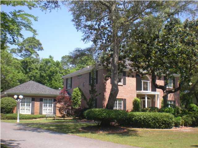 Elegance...Elegance and Comfort! From the exclusive gated community and the pave-stone driveway to the spectacular 2-story foyer which features a designer window and flowing staircase and landing instantly welcomes your guests. The formal dining room and family room will be wonderful to entertain in. The living room could easily double as an office or a den. The kitchen with granite counter tops is large enough for a table and chairs too! Behind the family room you will find a striking sun-filled Florida room over looking the resort quality backyard with its lovely refreshing Gunite pool with fountains, paver patio, quaint gazebo and relaxing hot tub perfect for BBQs & parties! Upstairs find the master suite with a double door entry, his and her closets and vanities a garden tub and