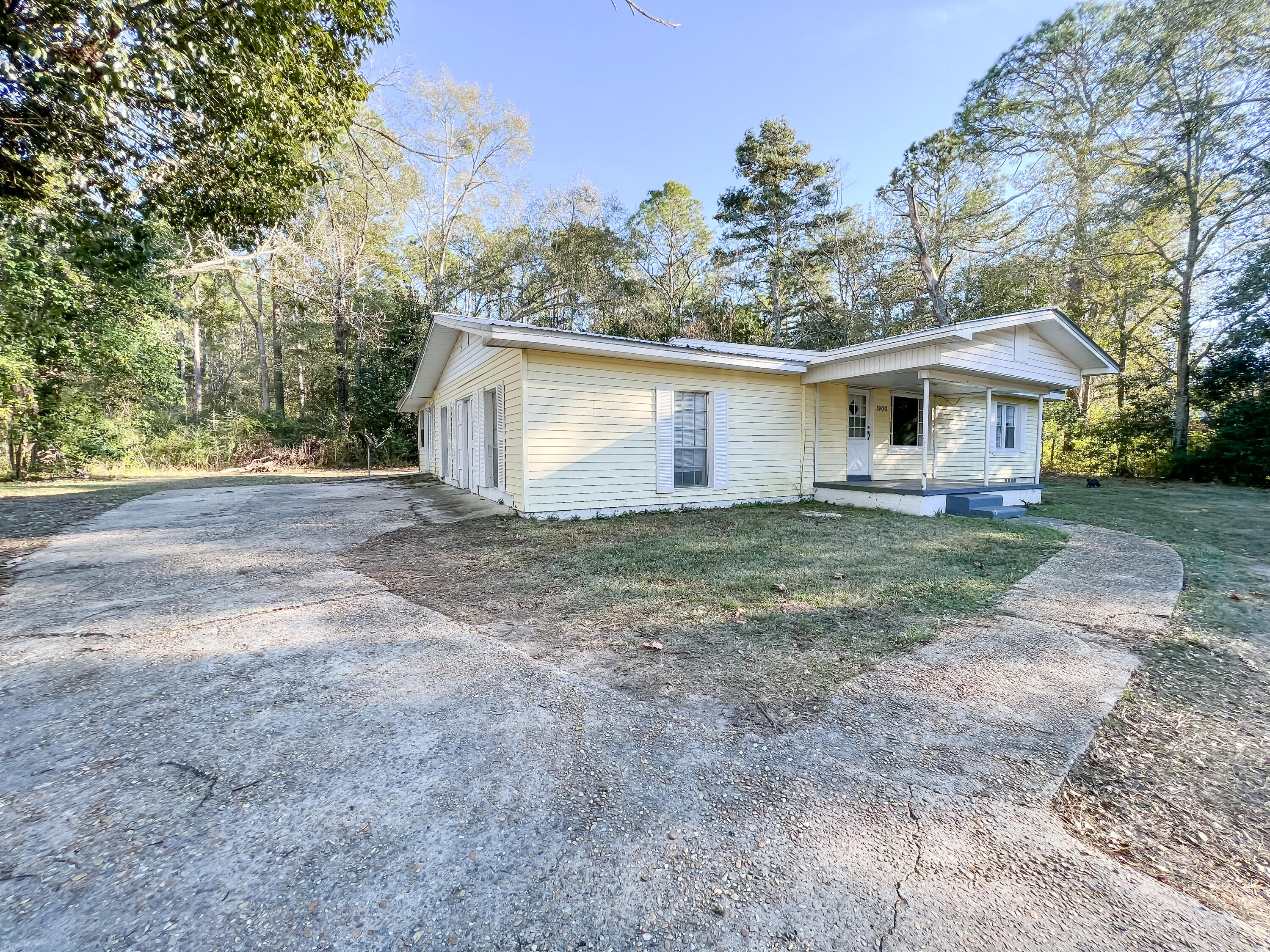 Reduced! This charming 4 bedroom/2 bath home is conveniently located on Hwy 79, North of Bonifay. Just a 45-minute drive to Panama City Beach and Dothan AL. Outside city limits but only a short drive to town. This location is just minutes from grocery stores, restaurants, shopping and auto stores. The home has a private entry to the master bedroom and the bedroom located in the back of the home. It has a large living room and an even larger den with its own entry. The home was fully renovated a few years ago. Plenty of elbow room in this spacious home. Call today!