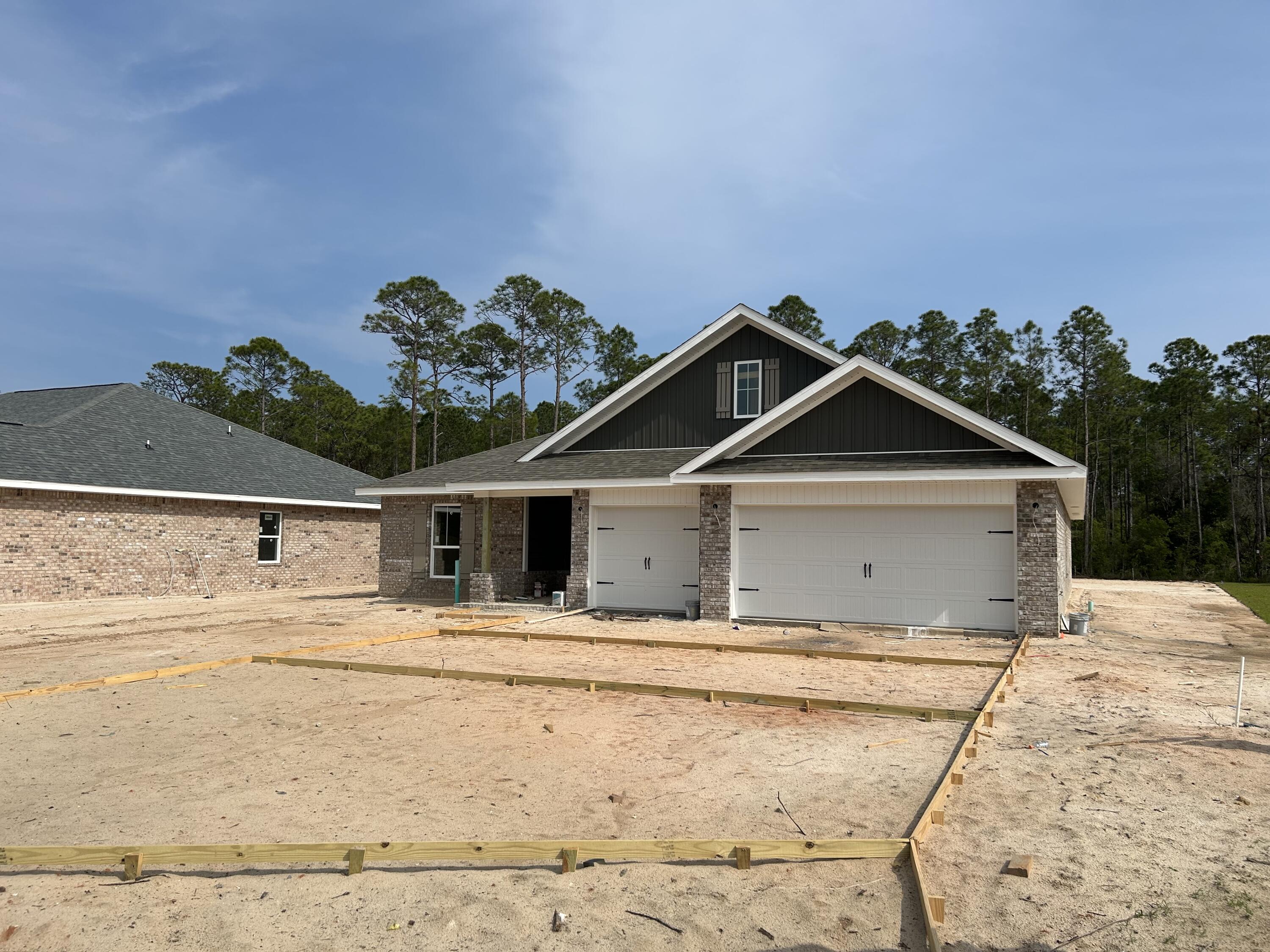 * 2x6 Exterior Construction *4 BR 3 Full Baths, 3 CAR GARAGE, Family Rm w/10 ft Ceiling, Breakfast Area & Formal Dining *Kitchen Features: Granite Countertops, Large Island, Shaker Style Cabinets, Stainless Steel Appliances & Walk in Pantry * Main Suite Features: Builder's Signature Zero Entry All Tile Walk in Shower, Separate Soaking Tub, Double Vanities & Walk-in Closet *Covered Front Entry & Rear Lanai * Lawn Pump, Well & Irrigation in Sodded Area * Builder Warranty Included *