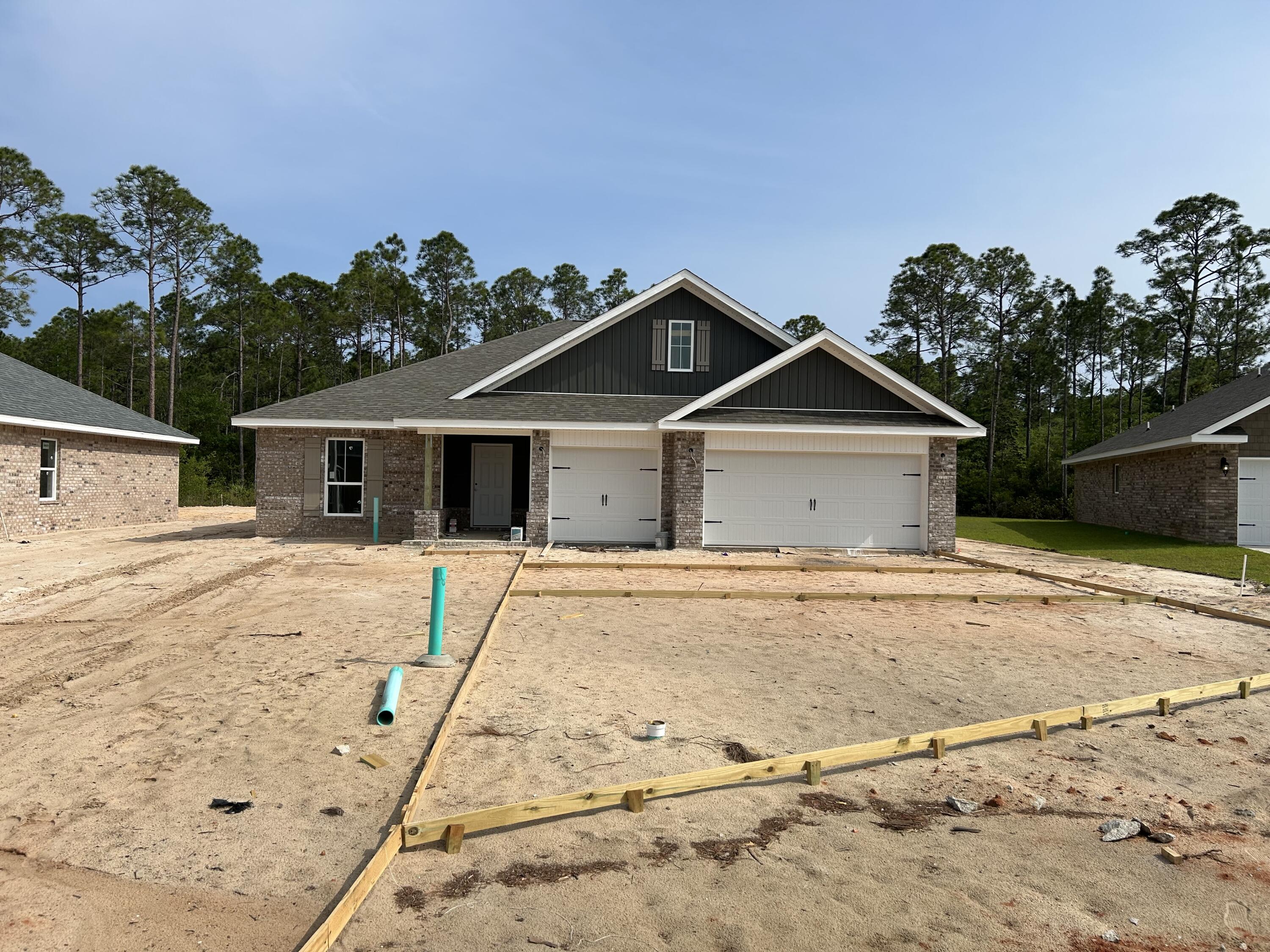* 2x6 Exterior Construction *4 BR 3 Full Baths, 3 CAR GARAGE, Family Rm w/10 ft Ceiling, Breakfast Area & Formal Dining *Kitchen Features: Granite Countertops, Large Island, Shaker Style Cabinets, Stainless Steel Appliances & Walk in Pantry * Main Suite Features: Builder's Signature Zero Entry All Tile Walk in Shower, Separate Soaking Tub, Double Vanities & Walk-in Closet *Covered Front Entry & Rear Lanai * Lawn Pump, Well & Irrigation in Sodded Area * Builder Warranty Included *
