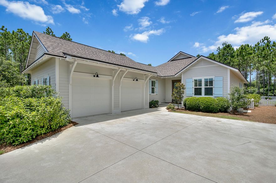 Immaculate four bedroom three bathroom home in Origins for rent. This 2,300 sq ft home offers the best of single floor living, with a spacious open living area. Enjoy the gas fireplace, screened porch, and all the community amenities, including free golf, community pool, clubhouse and access to Lake Powell. The house sits on a large corner lot backing up to woods, providing privacy and beautiful views. Many upgrades include quartz counters and gas range in kitchen, marble counters and oversized tubs in bathrooms, and plantation shutters throughout. Large two car attached garage. Washer and dryer included. renter to verify all dem.