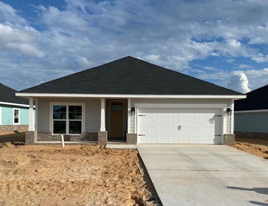 Limited time offer - 5.99% fixed interest rate, while loan money lasts!  Hurry!!  Most closing costs also paid when a preferred lender is used.
Located just 20 minutes from South Walton beaches and within a mile of Freeport High School.  This Craftsman style home has 3 bedrooms & 2 baths.  Brick skirt with Hardiboard siding. Large covered patio out back with screens and screen door.  Open concept plan with a cathedral ceiling in the main living area, 9' ceilings in bedrooms 2 & 3 & a 10' trey ceiling in the Master Bedroom.   8' entry doors, quartz countertops and durable CoreTec Pro Plus LVP flooring in main living areas, carpet in bedrooms.  Fully sodded yard, sprinkler system w/well & pump, garage door opener & pull-down attic stairs. Expected construction completion: Nov 2023.