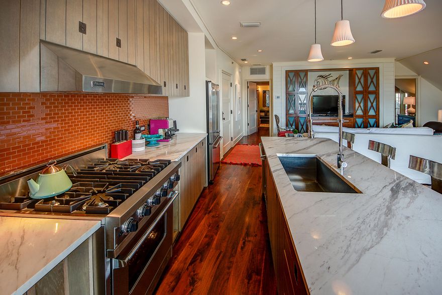 1 BEDROOM + PRIVATE BUNK ROOM NEVER RENTED luxury condo in the heart of Rosemary Beach. Overlooking Barrett Square, enjoy Gulf Views from your 3 private balconies which all face South and East, providing afternoon and evening shade. Awe your guests with beautiful tile work in the kitchen and bathrooms, Grohe fixtures, Viking appliances and Carrara marble countertops. Offered fully furnished, the unit comfortably sleeps 6 and features a custom bunk room with a private bathroom. Conveniently, leave your car in your deeded garage parking space and enter the elevator to your top floor retreat. This condo also has a deeded personal storage unit in the garage. Schedule your private viewing of this incredible offering along Scenic 30A!