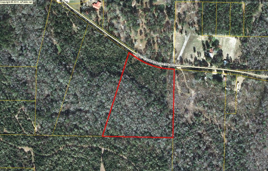 Great parcel at a great price! Located in a quiet and well established area. Trees are on the property, cut as you wish and build to suit! No restrictions! Manufactured homes and horses are allowed here! Don't miss out, call for your tour today!