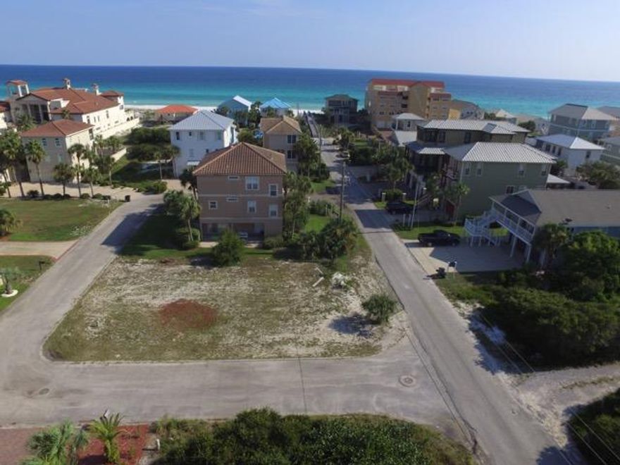 Location, Location, Location!! This lot has Gulf views, is very close to the beach walkover, in a quiet area, yet you have no HOA fees! Build your dream home or investment property here, close to the most beautiful beaches, shopping, restaurants, entertainment Destin has to offer. Upscale homes surround this lot so yours will fit right in! This is not a crowded public beach surrounded by condos, mostly single family homes here. Come see this lot! I can have a builder can meet with you to discuss what you can fit on the lot and at what cost. This lot can have a large 3 story home, with a garage and pool. It will be great for rentals, a second home, or full time living. Buyer to verify all dimensions and drone views.