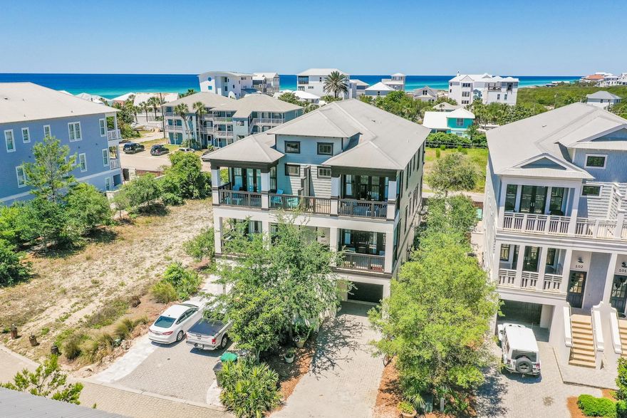 Providing gulf views and luxury living just moments from the white sands of Inlet Beach, this bespoke Enclave at Inlet townhome offers an elaborate collection of amenities packed with investment potential. Enjoy a private heated pool crowned with a spa, a heated and cooled garage with travertine floors, murphy bed and game zone, and an entirely separate apartment with full kitchen, murphy bed and bathroom--this retreat has grossed approximately $100K in 2020. 5 bedrooms (one with bunks & no closet), a small office off the living room, elevator to all floors, designer finishes, shiplap detailing, beamed ceilings, high-end appliances and 3 covered balconies plus beautiful poolside patio with gas grill and shower. Plus put toes in the sand just over 180 yards away at the Phillips Inlet Access!