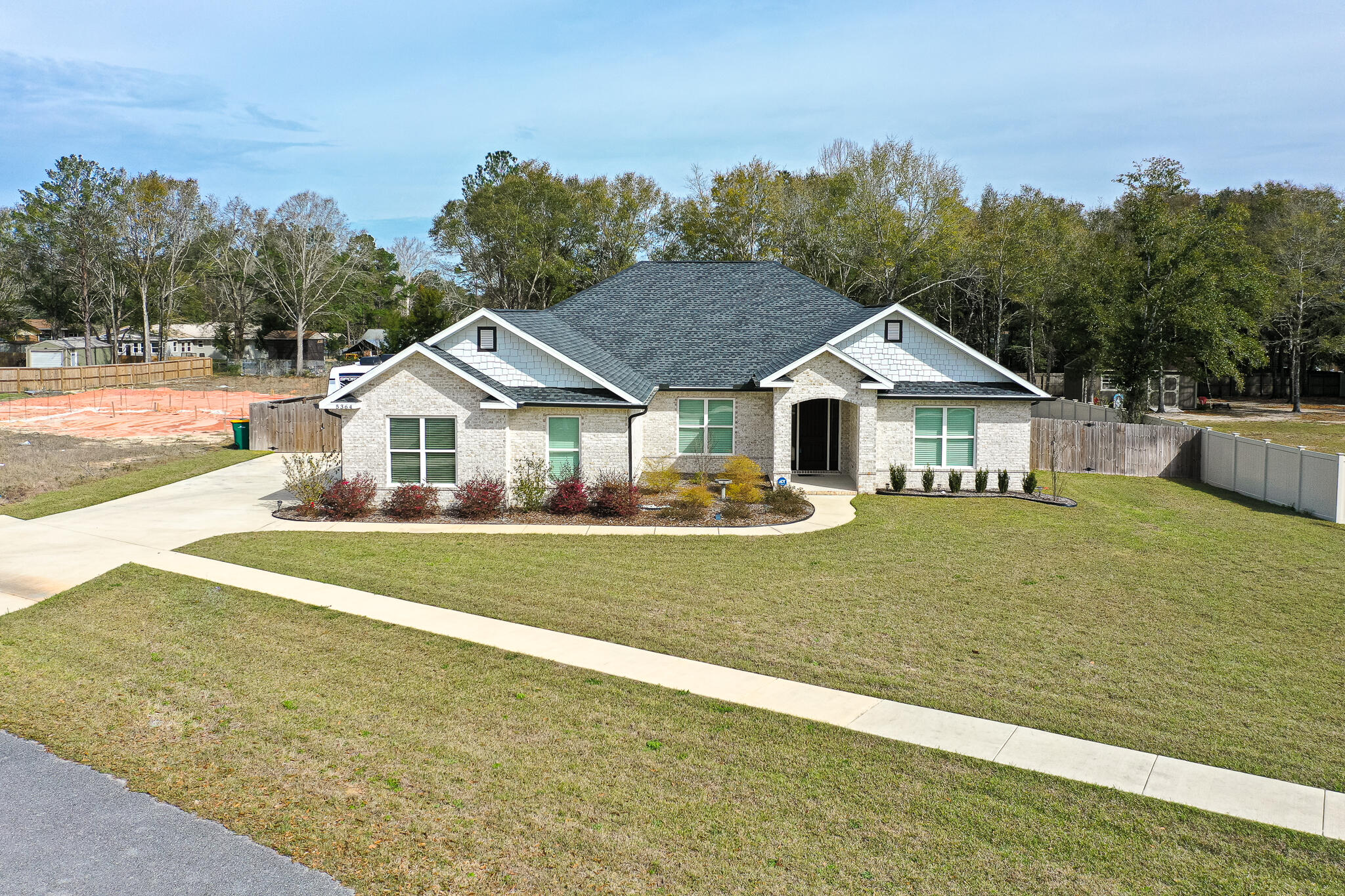 GORGEOUS HOME IN CRESTVIEW!! SALT WATER POOL!! Pull into the oversized driveway with RV parking and step inside to see a spacious floorplan guiding you through the home. In the main living area, you'll find trey ceiling with ceiling fan and recessed lighting. Discover a kitchen made for entertaining with luxurious features like the breakfast bar, farmhouse sink, island, granite countertops, and pot filler over the stove. The elegant features don't stop there; the master bath holds a jetted bathtub, frameless glass walk-in shower and granite counter tops on the double vanity. On the other side of the home are the three additional bedrooms and bathroom. The endless backyard allows for plenty of space for outdoor activities. Spend your days..