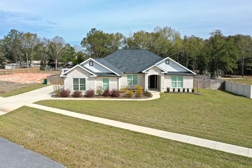 GORGEOUS HOME IN CRESTVIEW!! SALT WATER POOL!! Pull into the oversized driveway with RV parking and step inside to see a spacious floorplan guiding you through the home. In the main living area, you'll find trey ceiling with ceiling fan and recessed lighting. Discover a kitchen made for entertaining with luxurious features like the breakfast bar, farmhouse sink, island, granite countertops, and pot filler over the stove. The elegant features don't stop there; the master bath holds a jetted bathtub, frameless glass walk-in shower and granite counter tops on the double vanity. On the other side of the home are the three additional bedrooms and bathroom. The endless backyard  allows for plenty of space for outdoor activities. Spend your days..