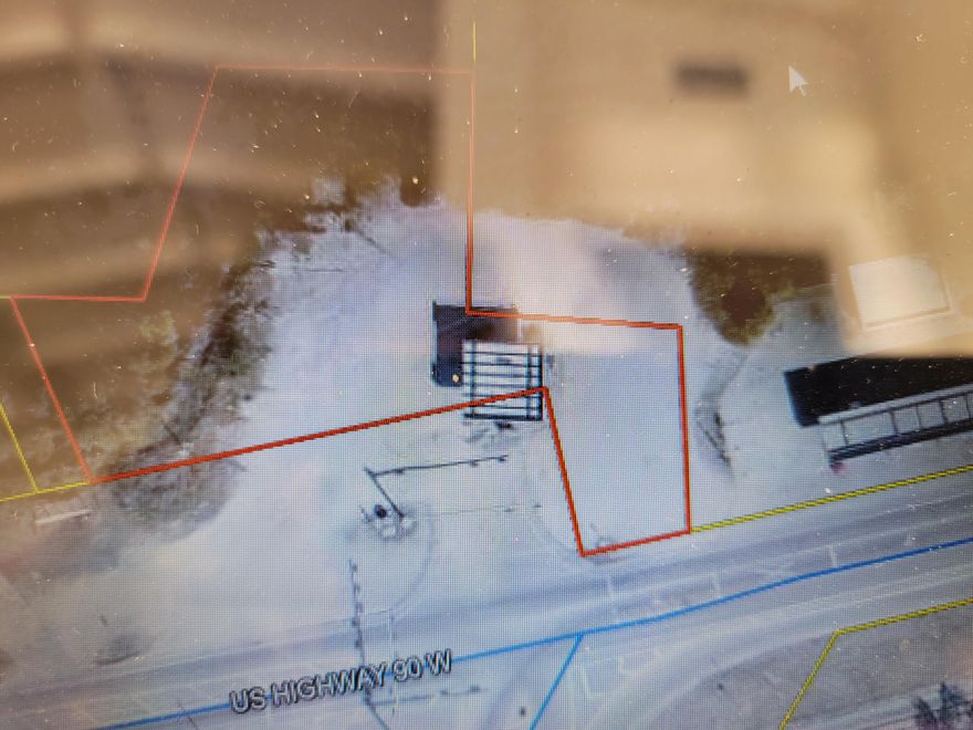 Land only.  Just over an acre.  zoned heavy industrial.  If you need different you need to go to Walton County for rezoning. Seller will Lease on 99 year lease or willowner finance.  One of the few propertiesthat already has the redlight in and is a dead end property at highway 90 and 285.This has a month to month lease.  tennant needs a 30 day notice to vacate