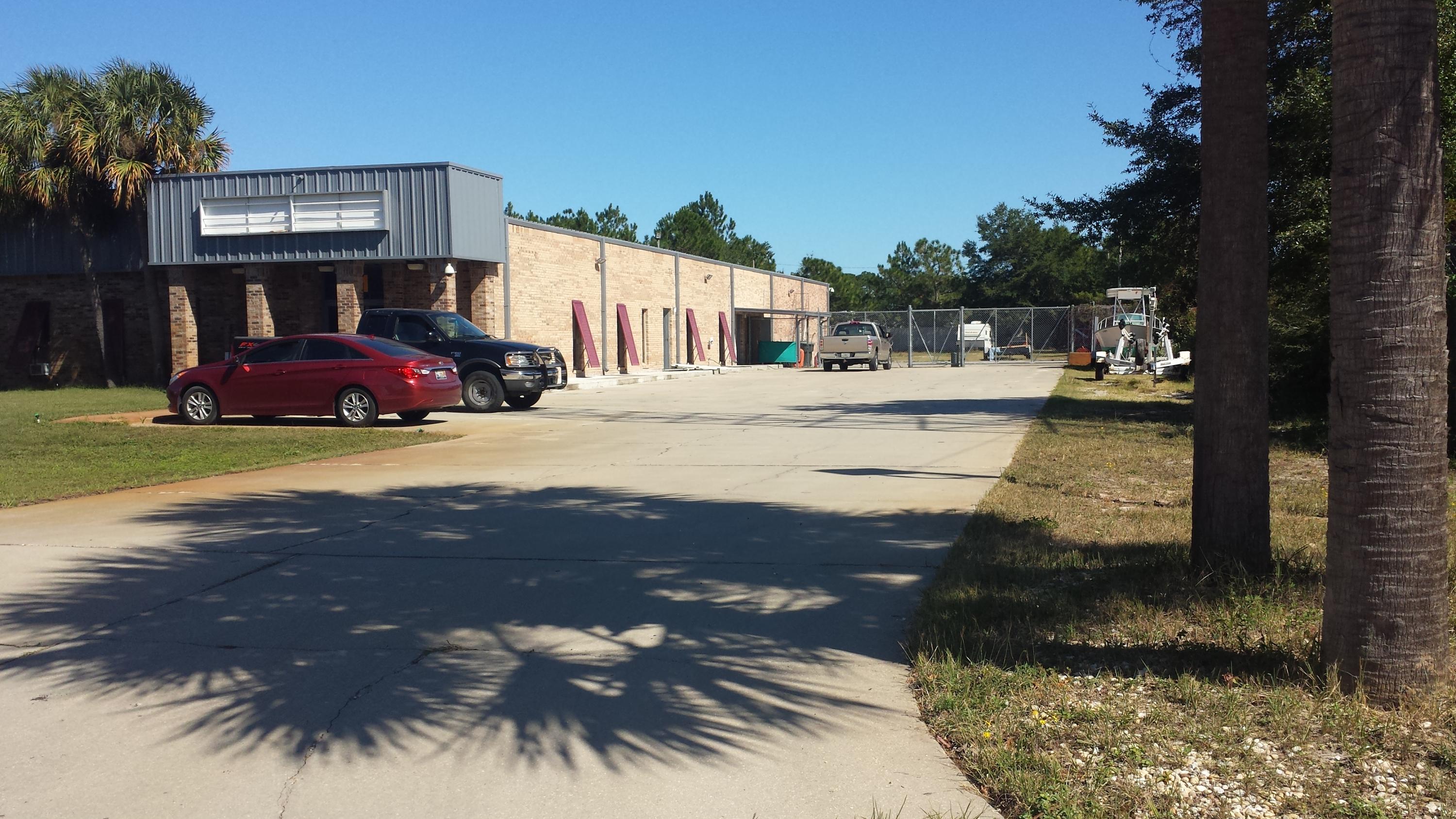 PRIME LOCATION FOR A INDUSTRIAL AND/OR MANUFACTING BUSINESS! MULTI USE FACILITY! THIS LOCATION IS A PRIME PIECE OF REAL ESTATE! Located close to Hurlburt Field and Eglin Air Force Base in the Fort Walton Beach Industrial Park. this all brick building has 4 offices could be 5, a reception area, 3 1/2 baths, 1 full bathroom w/ shower, kitchen/ break room, laundry area, lots of space for storage and manufacturing. Plenty of opportunities for expansion. Other important factors this property, A/C has 2 zones, 3 Ph electric, 500 amps, oversized rollup door. 12 parking spaces in the front/side of the building and then more parking spaces in the fully gated back work/ storage area Currently there are Pods in the back that produce s$2500/month income and the back shop generates $1000/month income