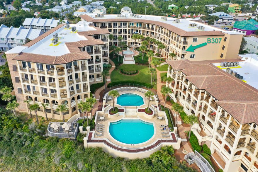 Coastal elegance awaits you in immaculate Bella Vita B307, a third-floor luxury residence in Blue Mountain Beach currently enjoyed as a primary residence. Relax on the expansive 319 sq. ft. veranda which extends the main living area and creates an outdoor living room with awe inspiring views of the Gulf, piazza and fountain leading to the Sunset Deck, two picturesque swimming pools, of which one is heated, and 365 feet of private beach. Rising above the highest point on the US Gulf Rim, living abounds from this luxurious, 3 bedroom, 3.5 bath updated home. Attention to detail and an eye for design is reflected in the owner's remodel. Step right into this chic, partially furnished condominium home with hard surface floors throughout. Upon entering, you will see, the Open Floor plan marries the kitchen, dining and living room while providing distinct comfortable spaces for entertaining coastal style.  The radiant kitchen features bright, white painted Lynn Prestige custom cabinetry, ample quartz countertop space and beautiful marble backsplash. The dramatic Master Bedroom with gulf views lets on to the veranda and features two walk-in closets and a beautiful spa-like remodeled Master Bath. The guest ensuite bedrooms are separated from the master for the ultimate privacy and each guest bath has been updated. Full list of improvements available upon request.
As a Bella Vita resident, you will enjoy a gated and brick paved entrance, ample garage owners' parking, individual and shared storage, Fitness Center, Great Hall with conversational seating areas, kitchen, library and patio. A total of only 48 residences on 6 acres have 365 feet of beach to enjoy. Rentals are restricted to a minimum of 30 days. B307 is in the B Building so owners enjoy the added convenience of the Porte Cochere Entry at the Great Hall. You will immediately see the pride of ownership within the grounds and buildings of Bella Vita reflected by meticulous upkeep. Walk to a variety of restaurants, plus a bakery and lunch shop, a health food store, ice cream and donut shop, or rent or buy a bike steps away. Hop on the 30A bike path and explore the shopping, dining and entertainment of the nearby coastal towns. Retreat to your balcony at the end of the day in Bella Vita! No short term rentals. We invite you to make an appointment to see B307 and discover the beautiful life in Bella Vita!
