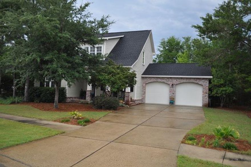 Pond front custom home offers 3 bedrooms and 2 full bathrooms plus a powder room. Featuring: 2,368 of open living space, 8' doors and window trim, granite counter tops, split bedroom, screen porch. HOA, Cable and garbage included. Enjoy all that Hammock Bay life has to offer.Hammock Bay is a pedestrian-friendly development. There are network of sidewalks, nature trails, and bike paths. The Hammock Bay Town Square-lawn-style amphitheater is designed for entertainment. There is also a $12+ million, 60-acre Sports Park featuring a multitude of ball field/park amenities nearby. Recently the developer donated land for two schools to be built in Hammock Bay.The Lake Club at Hammock Bay includes a 25 meter lap pool and a resort-style pool, lighted tennis courts, putting green,