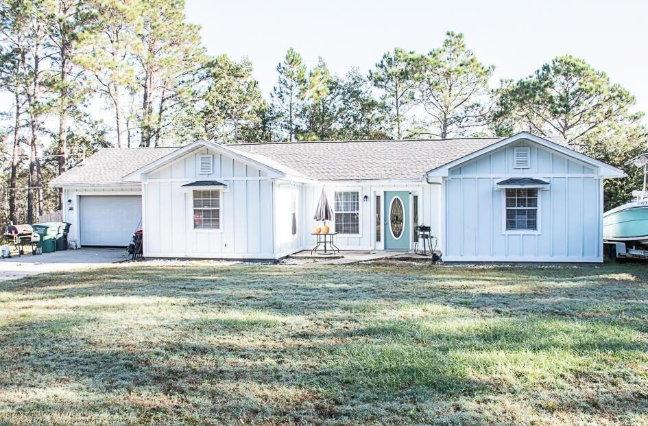 South Crestview home with easy commute to bases, beaches, and shopping. Vinyl plank flooring, open concept floor plan with spacious kitchen. Large Florida room with walk out deck. Large master bedroom with masterbath. Neutral paint and natural lighting in the home.