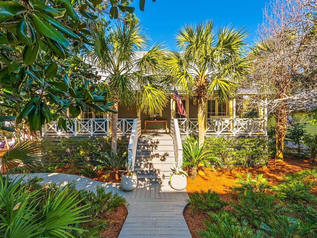From classic and contemporary to eclectic and funky, this Cayman Islands-style home captivates with architectural design by Mark Schnell and interior dcor by wife Paige Schnell of Tracery Interiors. The duo partnered with artisan Peter Horn on this idea cottage for Coastal Living Magazine, profiled in the December 2015 issue. The white kitchen features a panel ceiling, open shelving, high-end stainless steel appliances that include a dual-fuel Wolf range, Carrara marble counters and a large, maple butcher block island with sink, storage and space for seating on three sides. The open family room blends industrial components with nautical white beams and a vaulted ceiling. Exquisite hardwood floors and natural daylight provide an appealing gathering space. Bedroom and bathrooms are spacious and bright.
Outdoor entertaining reaches new heights with a stylish screened I dining porch overlooking a stunning outdoor patio - covered and open - with three gas top firepits. An incredible wine garden is perfect for tastings, brunch, cookouts, cocktails and conversation. Landscaping is all professionally designed for minimal maintenance. Room to add a pool and/or carriage house finishes off the large backyard. The location means walking access to the shopping, dining and entertainment offered by Seaside and the beaches can be counted in steps and are less than three blocks away. Old Seagrove Beach is especially notable for lush foliage in its pine, hickory and magnolia tree groves. The paper white beach sand and emerald green waters, makes this house in this community a sound investment with fun d????cor and intriguing design scheme.
Buyer is responsible for personally verifying details about this property. Any information contained within is believed to be accurate but is not guaranteed.
The square footage is larger then Walton County Appraisers office.