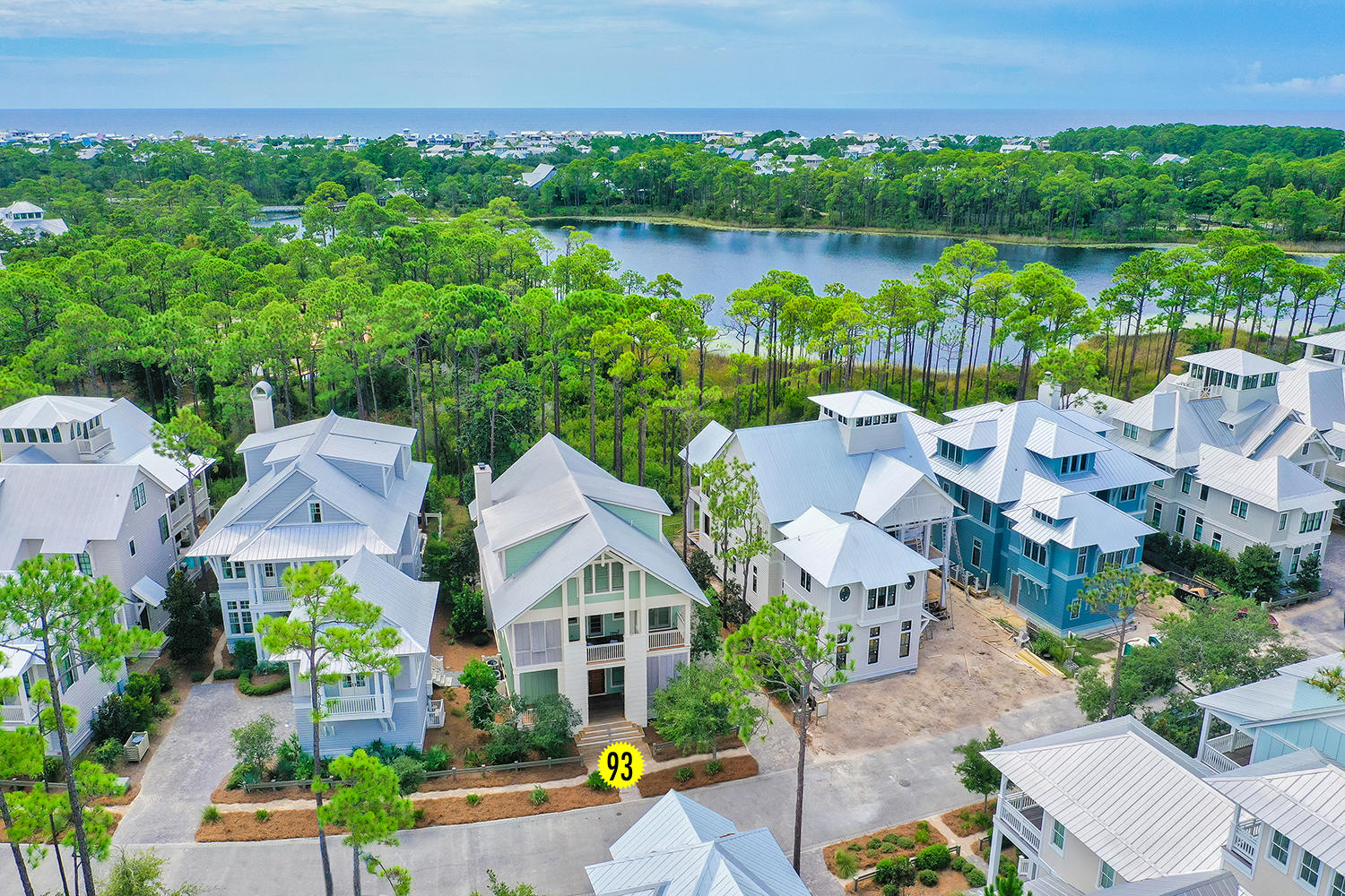 Gorgeous WaterColor Estate being offered for Auction! This 7-bedroom lakefront, vacation retreat with $288k in projected rental revenue will be auctioned off November 19th and you can't miss out!! Vermilion Way is a market in itself, this is the street to be on in WaterColor...a class all of its own. You never know who your celebrity neighbors might be *wink wink*. Completely remodeled with updated furnishings and all new paint, this incredible home comes fully furnished, turnkey and rental ready. Several new updates throughout the home including: all new hotel quality beds, new appliances and three new HVAC systems, new pool filtration system and has been professionally maintained and managed.The outside living area with expansive Western Lake views creates the perfect ambiance for an evening with friends and family creating memories to last a lifetime! The new Trex?? decking, outdoor summer kitchen and outdoor entertaining space around the pool back up to the serene wooded area surrounding Western Lake providing peace and tranquility for you and your guests.
The home was built in 2009 with entertaining, sophistication and serenity in mind including 12 foot ceilings adorned with exquisite crown molding throughout and oversized, glass accordion doors opening up to the peaceful wooded backyard, make this house the PERFECT vacation retreat. With three master suites accessible by elevator, bunk room and two living areas, this home is able to comfortably accommodate up to 20 guests.