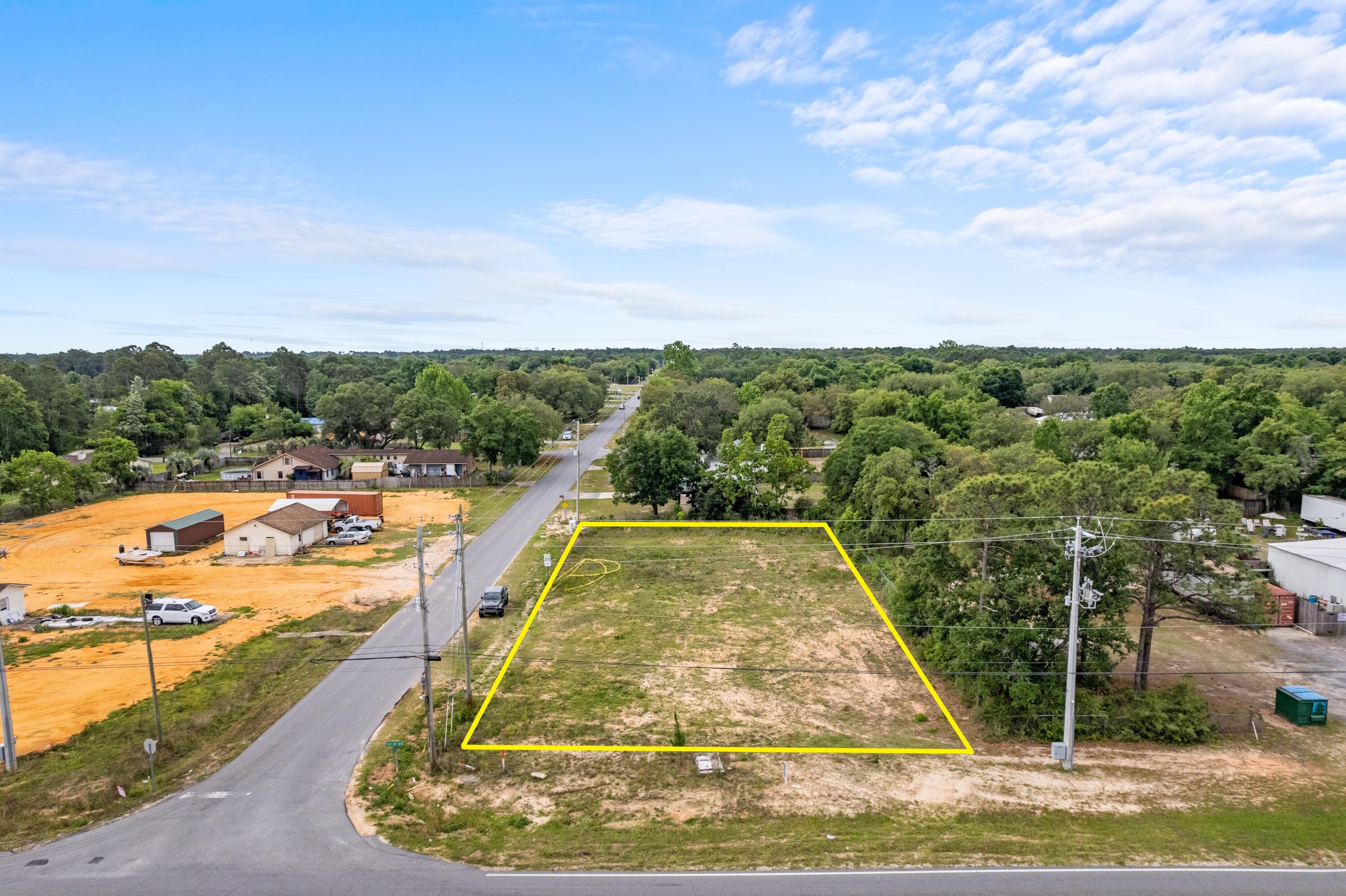 Now available is a perfect corner parcel for neighborhood commercial use. This site sits at the intersection of East Bay Blvd and Andorra Street with direct access to Highway 87 and Highway 98. This land is ideal for a small business owner to build a flex space of approximately 3,000sf to 4,000sf. These properties are extremely hard to find in the Panhandle and perfectly suited for an end user or as a warehouse investment.